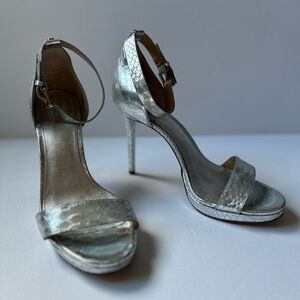 Michal Kors metallic silver Sienna embossed stiletto heels. Size 8.